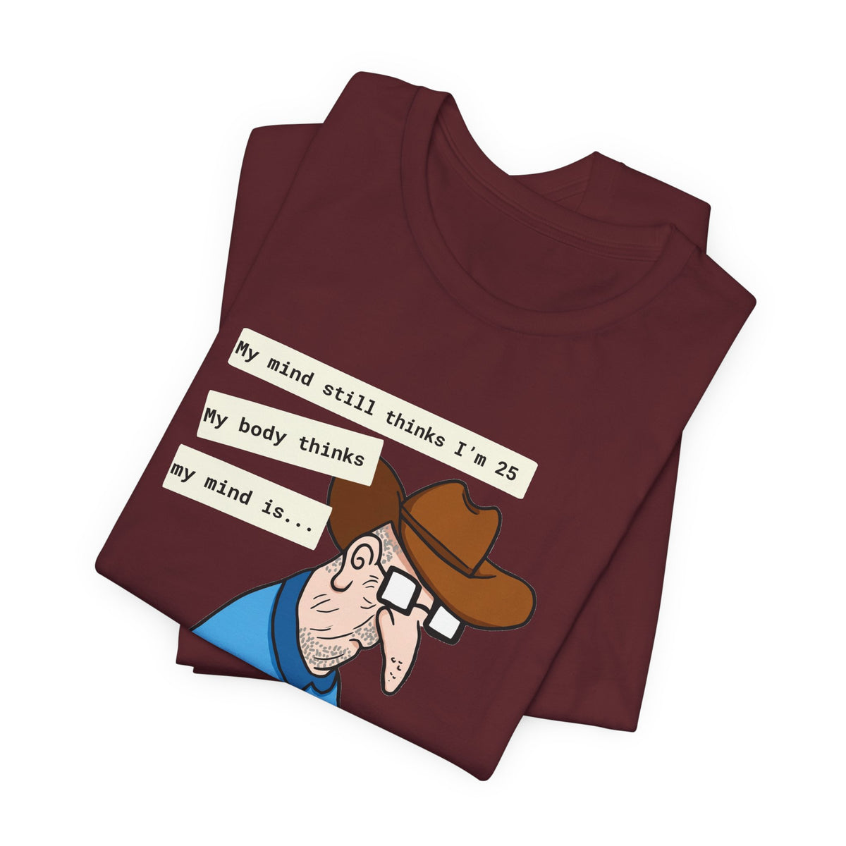 T-Shirt — Funny 'My Mind Still Thinks I'm 25, My Body Thinks My Mind Is an Idiot' Cartoon Tee
